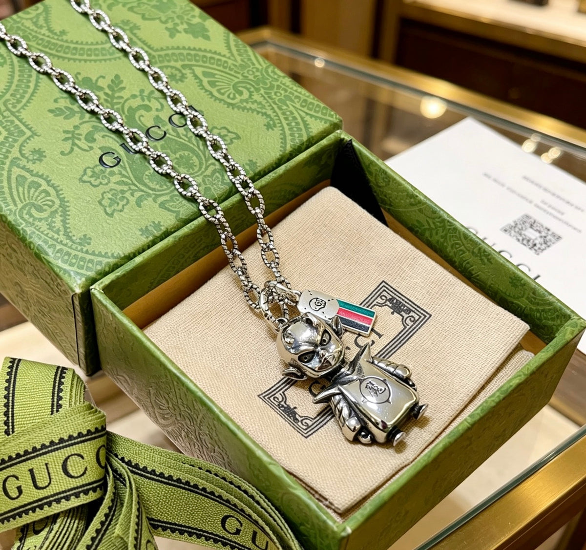 Double-G Emblem Pendant Necklace in Polished Metal-Tone – Vintage Detail – Design 047 close-up detail