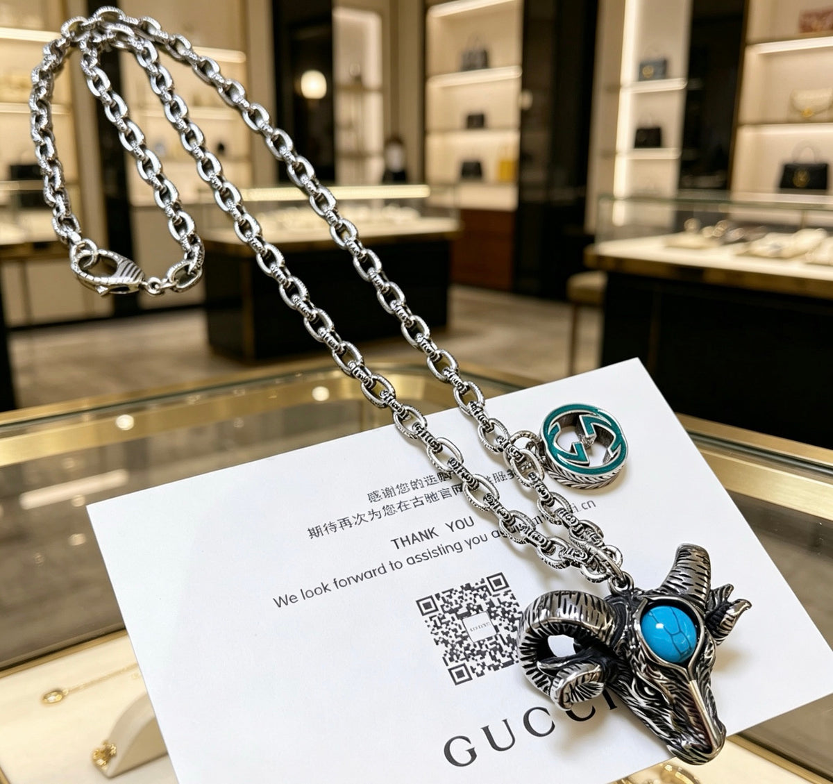 Double-G Emblem Pendant Necklace in Polished Metal-Tone – Design 252 close-up detail