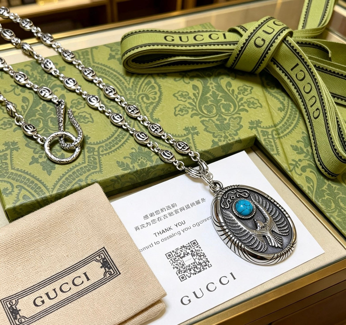 Double-G Emblem Pendant Necklace in Polished Metal-Tone – Design 167 close-up detail