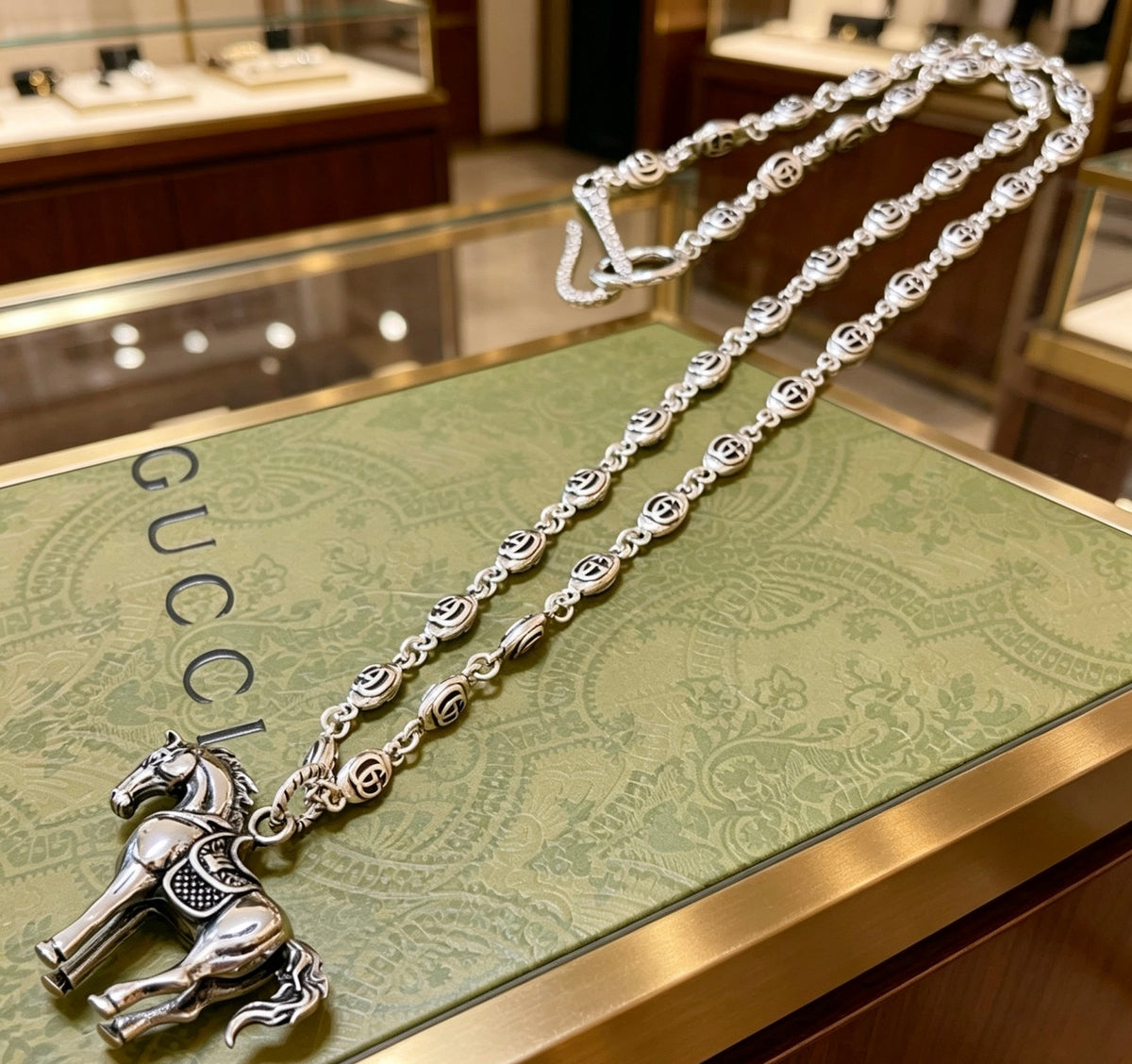 Double-G Emblem Pendant Necklace in Polished Metal-Tone – Design 164 close-up detail
