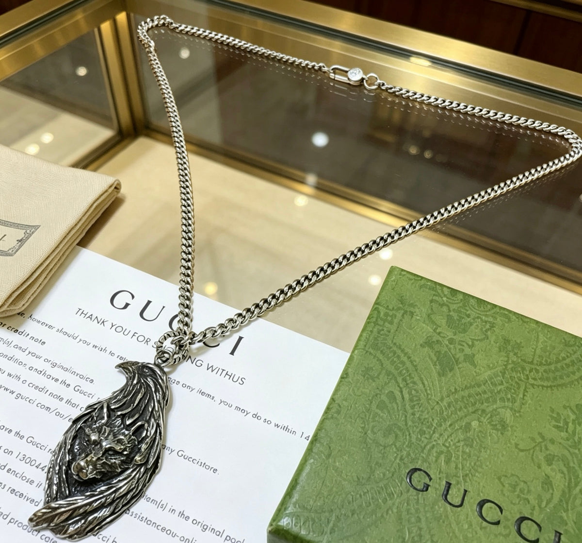 Double-G Emblem Pendant Necklace in Polished Metal-Tone – Design 161 close-up detail