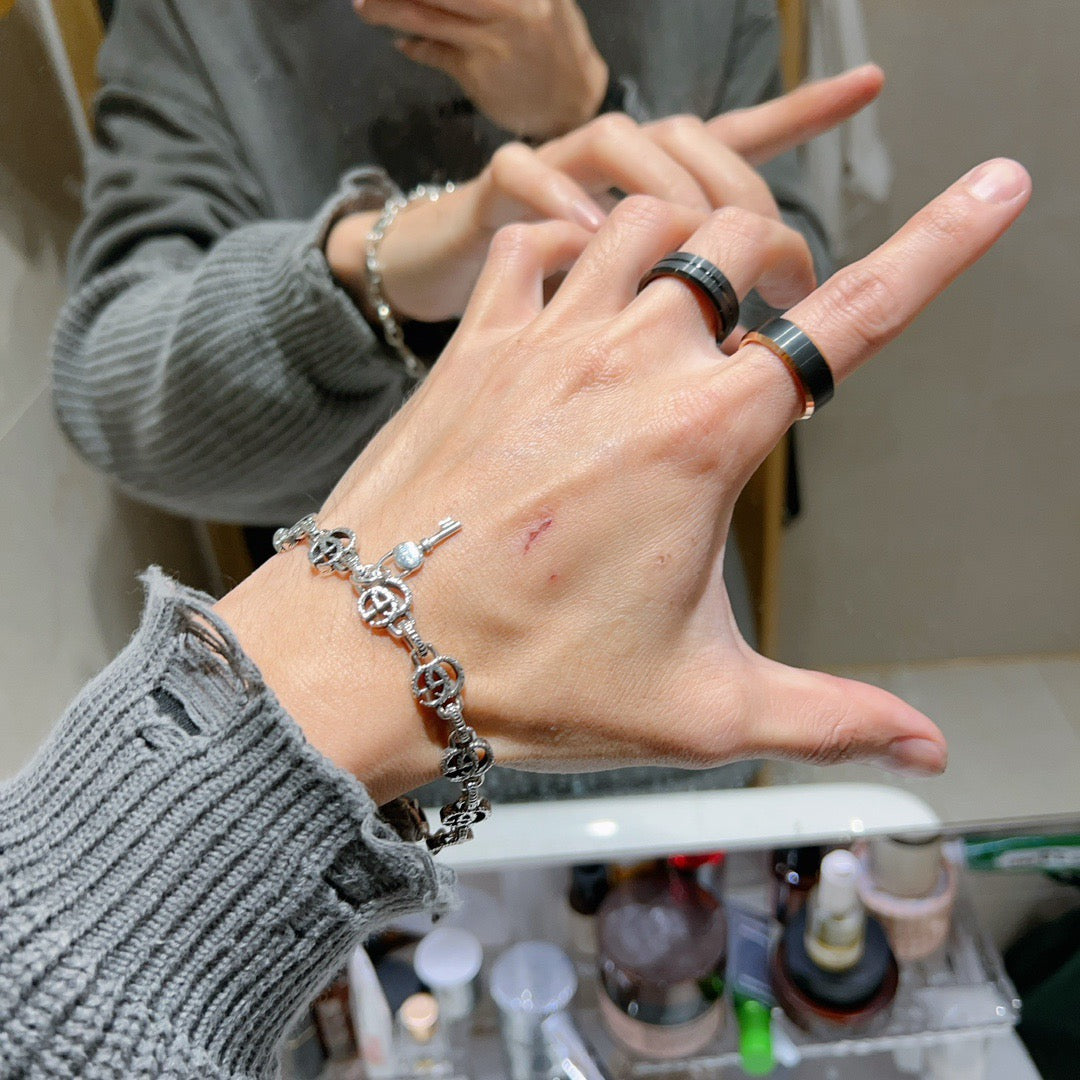 Geometric Emblem Bracelet in Polished Metal-Tone – Design 106 detail view