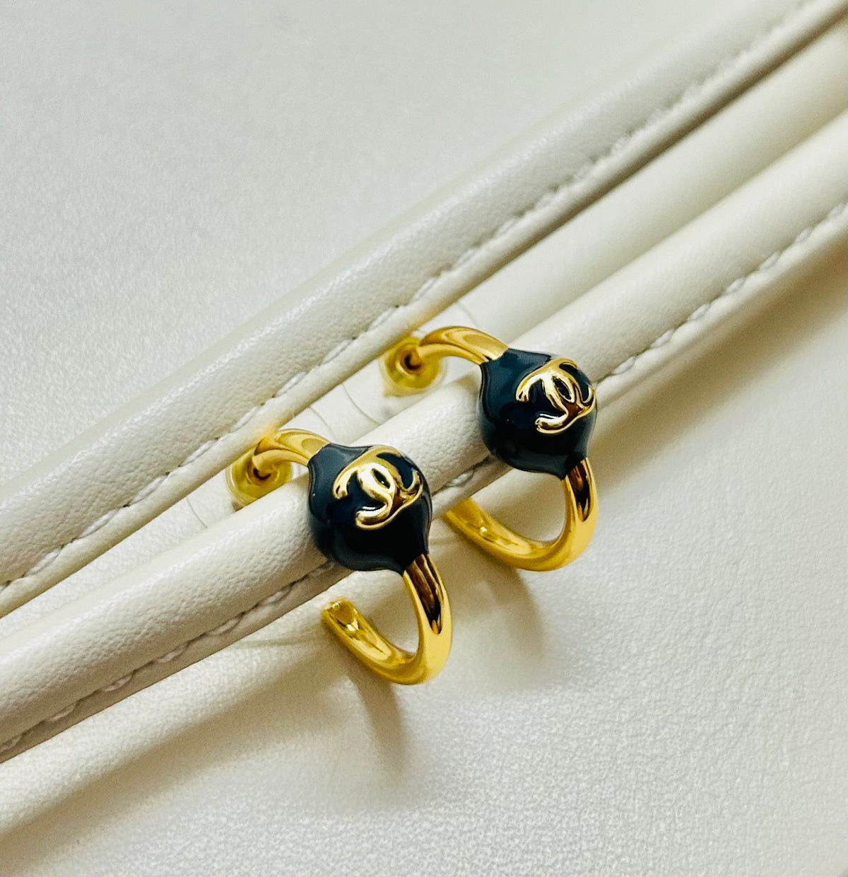 Signature Emblem Stud Earrings in Polished Metal-Tone – Design 111 styled product view