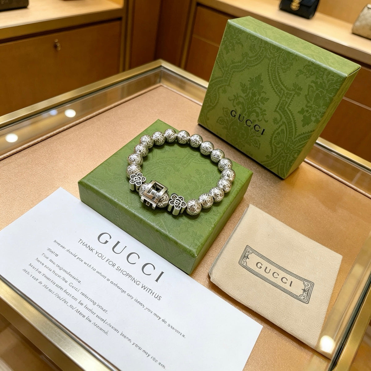 Double-G Emblem Bracelet in Polished Metal-Tone – Vintage Detail – Design 012 front product view