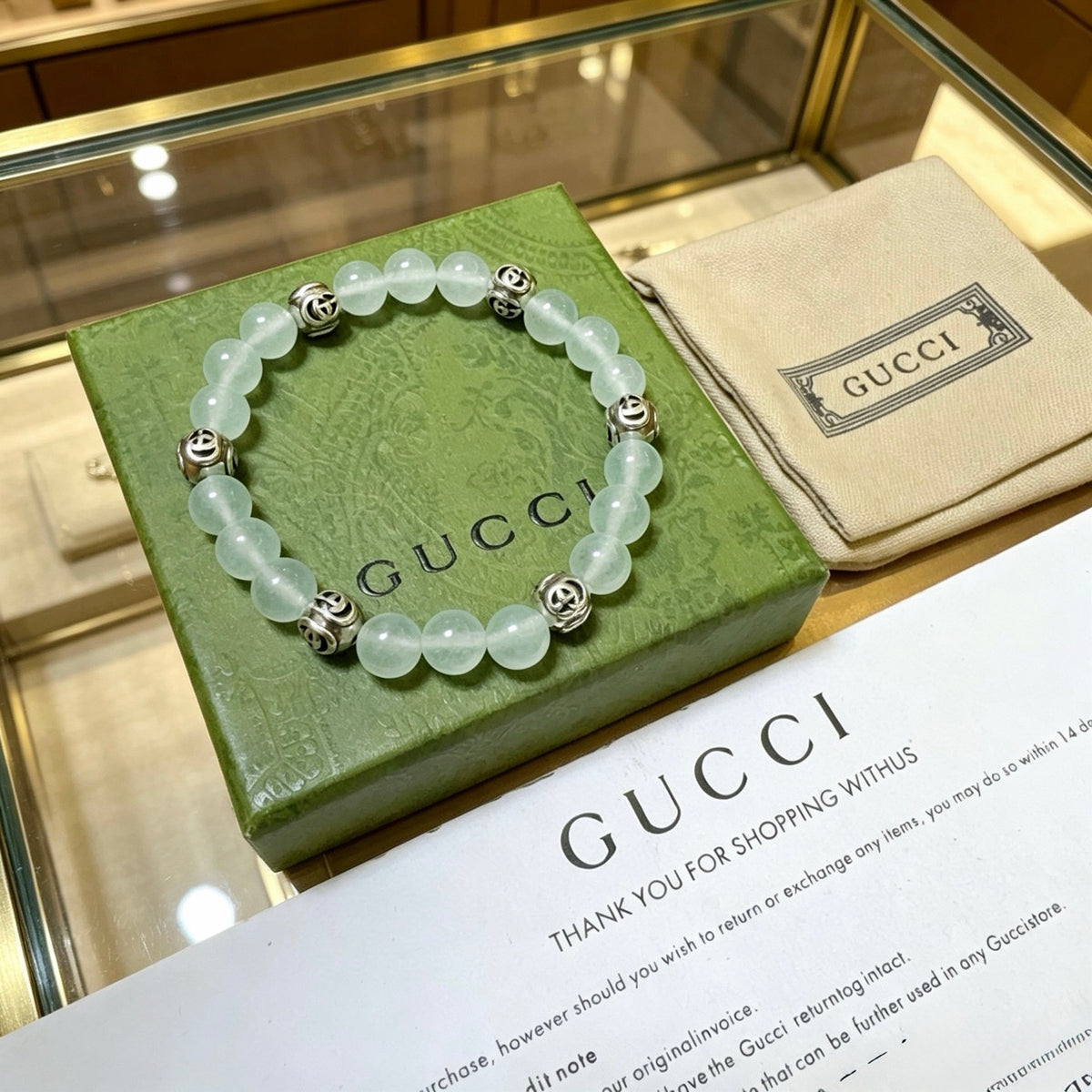 Double-G Emblem Beaded Bracelet in Polished Metal-Tone – Crystal Detail – Design 018 close-up detail