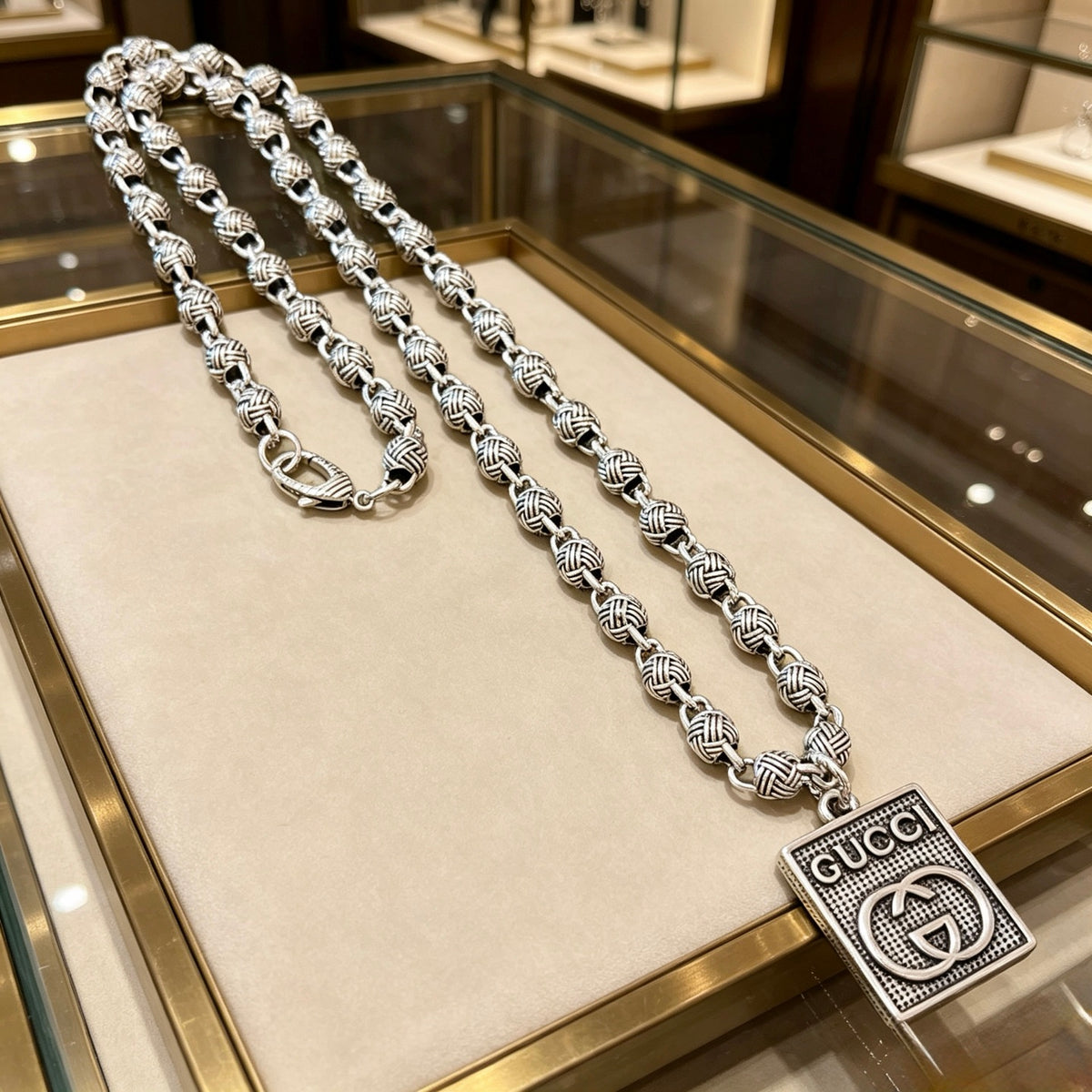 Double-G Emblem Pendant Necklace in Polished Metal-Tone – Design 220 main product view