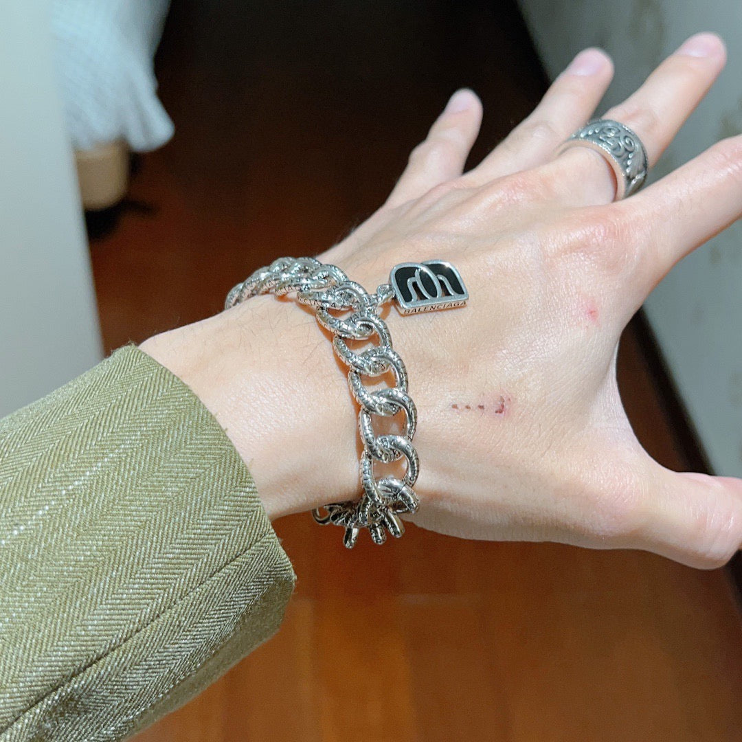 Geometric Emblem Bracelet in Polished Metal-Tone – Design 067 detail view