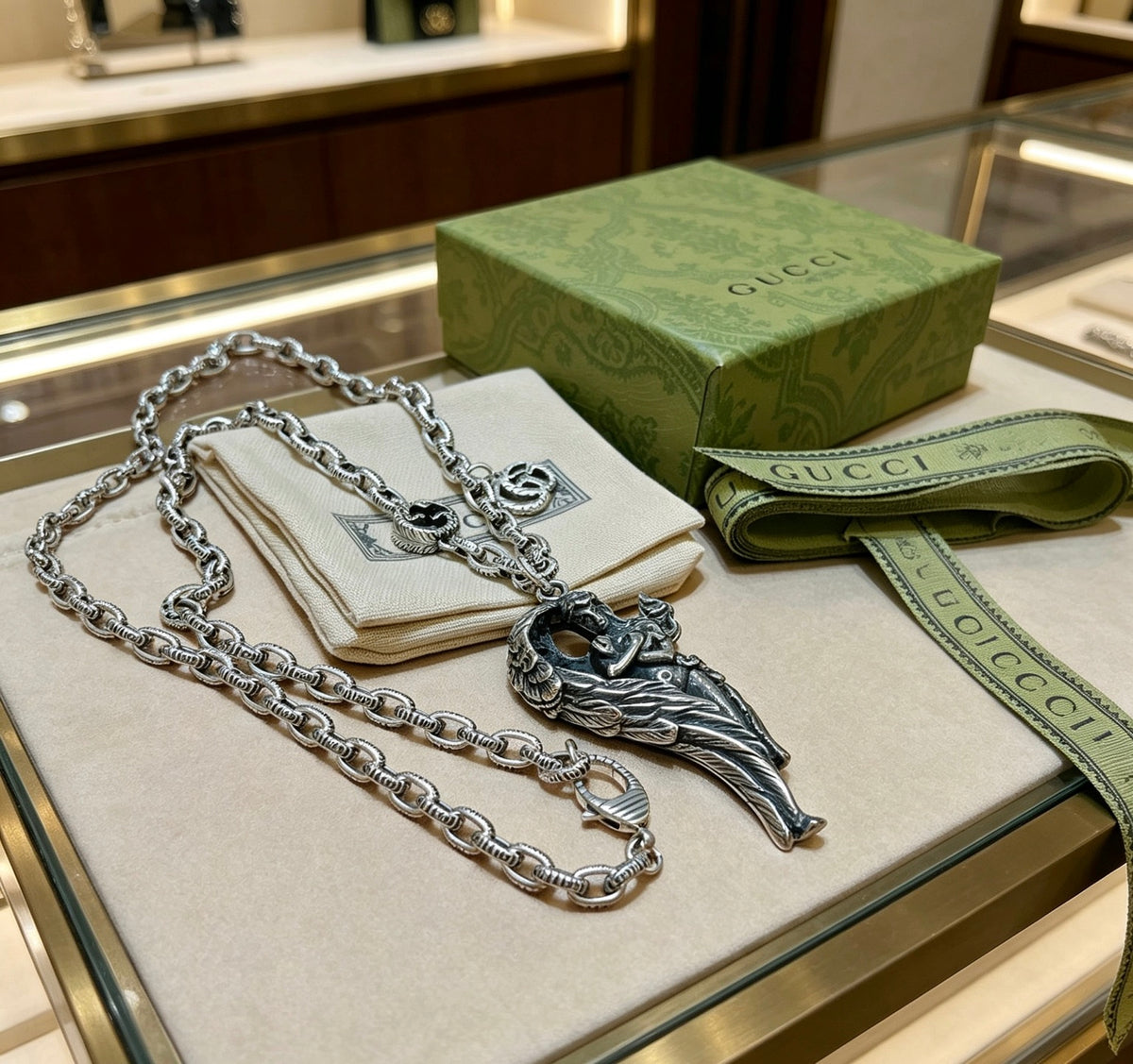Double-G Emblem Pendant Necklace in Polished Metal-Tone – Vintage Detail – Design 066 close-up detail