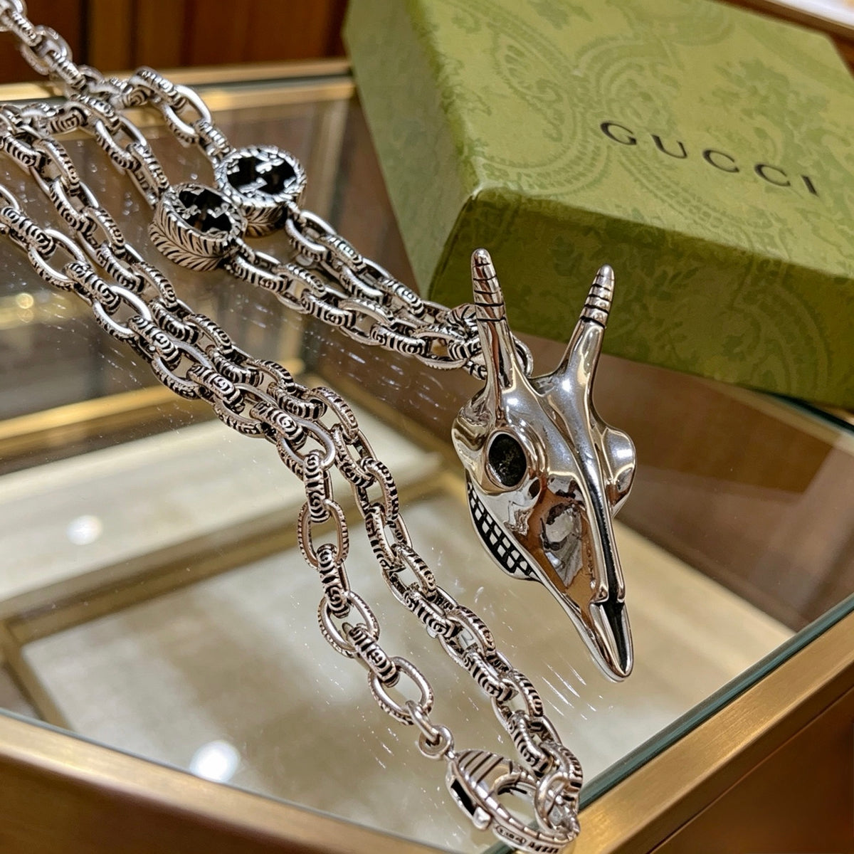 Double-G Emblem Pendant Necklace in Polished Metal-Tone – Vintage Detail – Design 071 close-up detail