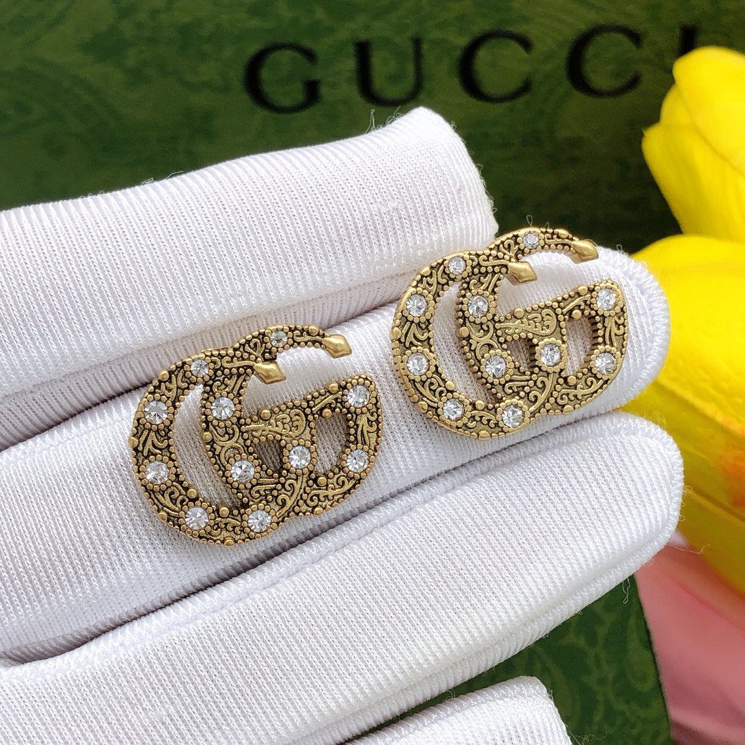 Double-G Emblem Stud Earrings in Gold-Tone – Vintage Detail detail view