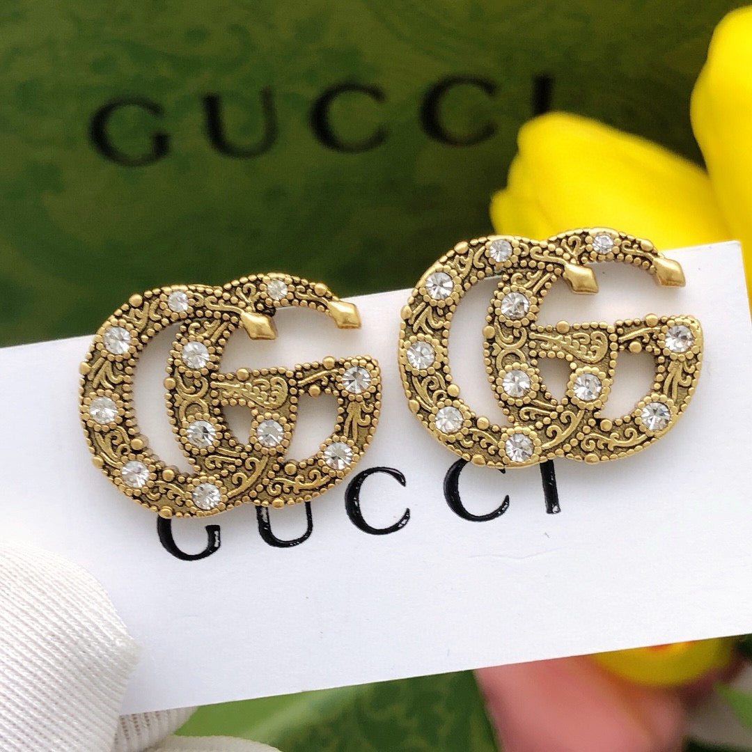 Double-G Emblem Stud Earrings in Gold-Tone – Vintage Detail close-up detail