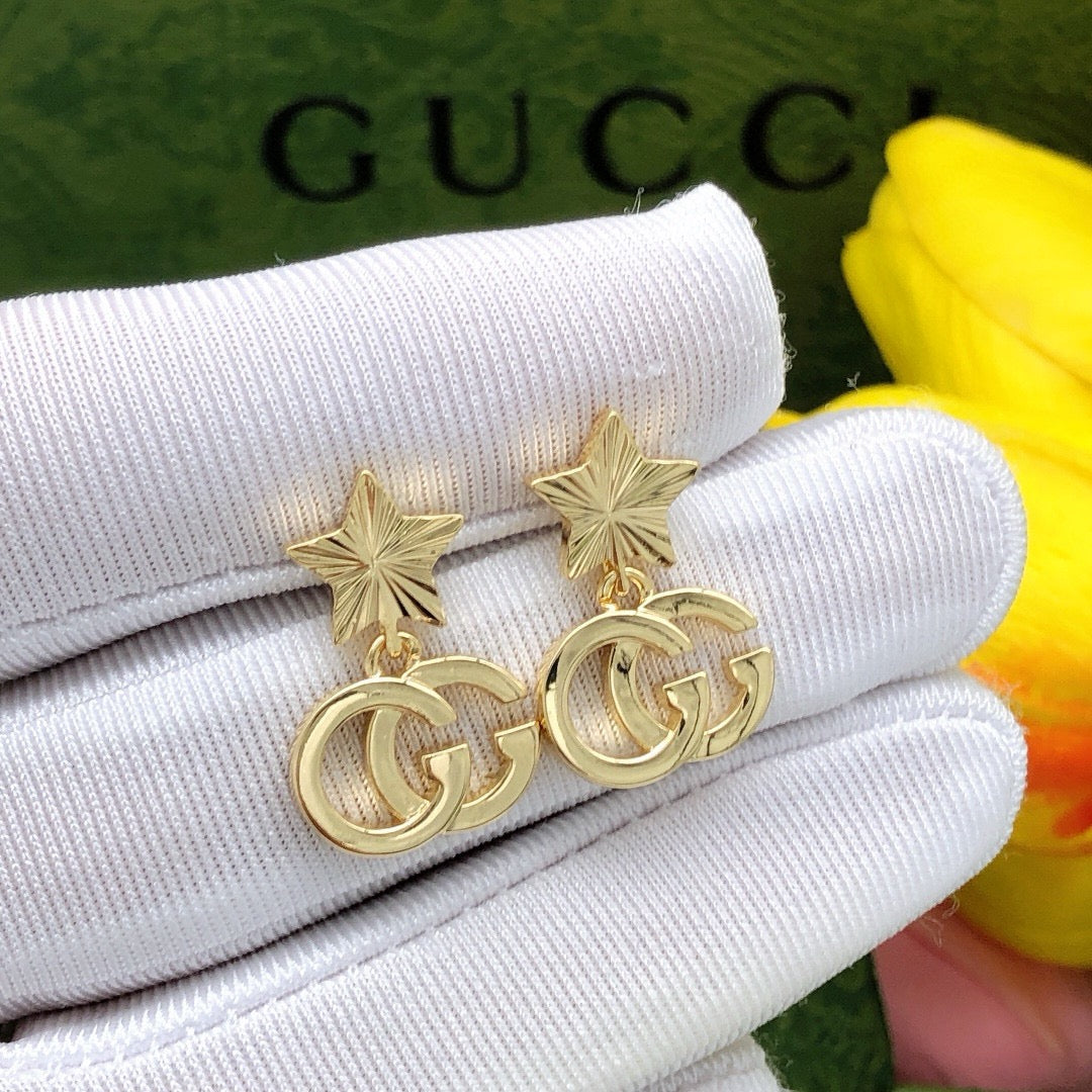 Star Stud Earrings in Polished Metal-Tone detail view