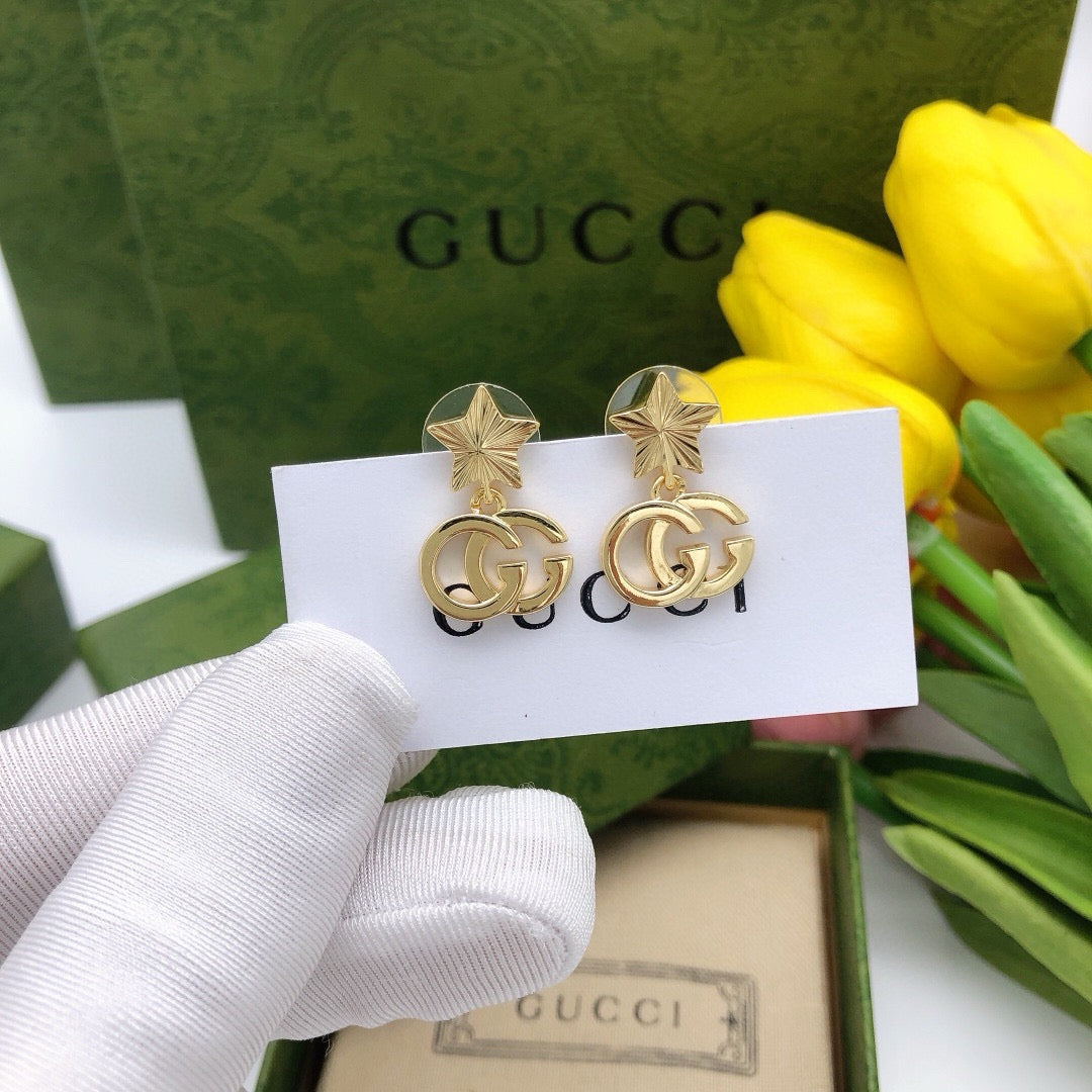 Star Stud Earrings in Polished Metal-Tone front product view