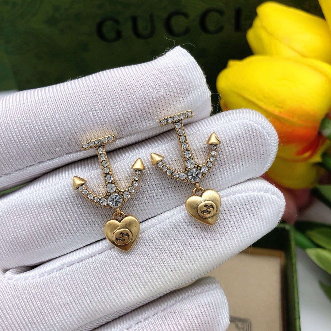 Heart Stud Earrings in Polished Metal-Tone detail view