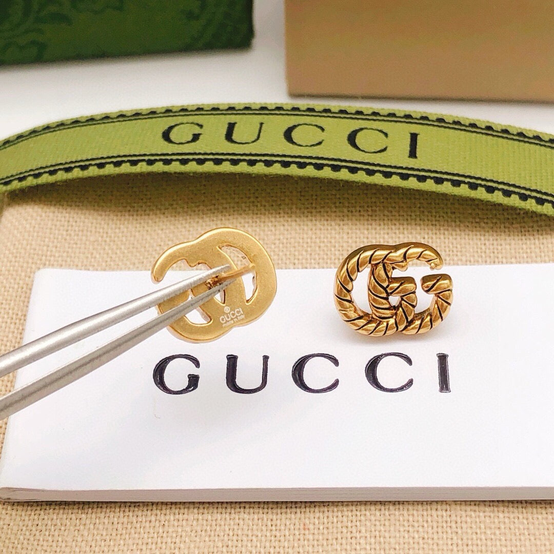 Double-G Emblem Stud Earrings in Polished Metal-Tone – Design 034 front product view