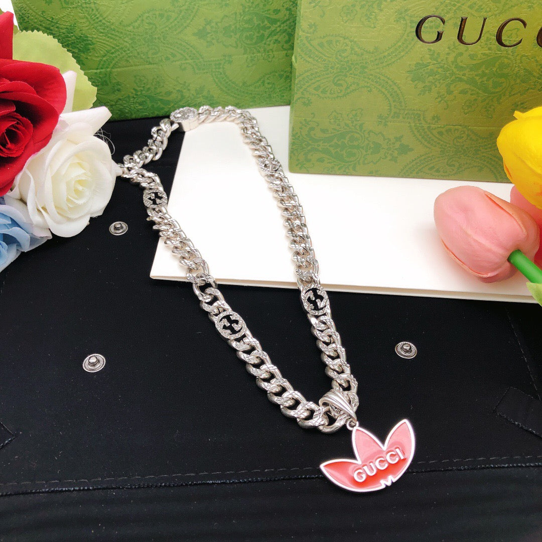 Chain Pendant Necklace in Gold-Tone – Red Detail detail view