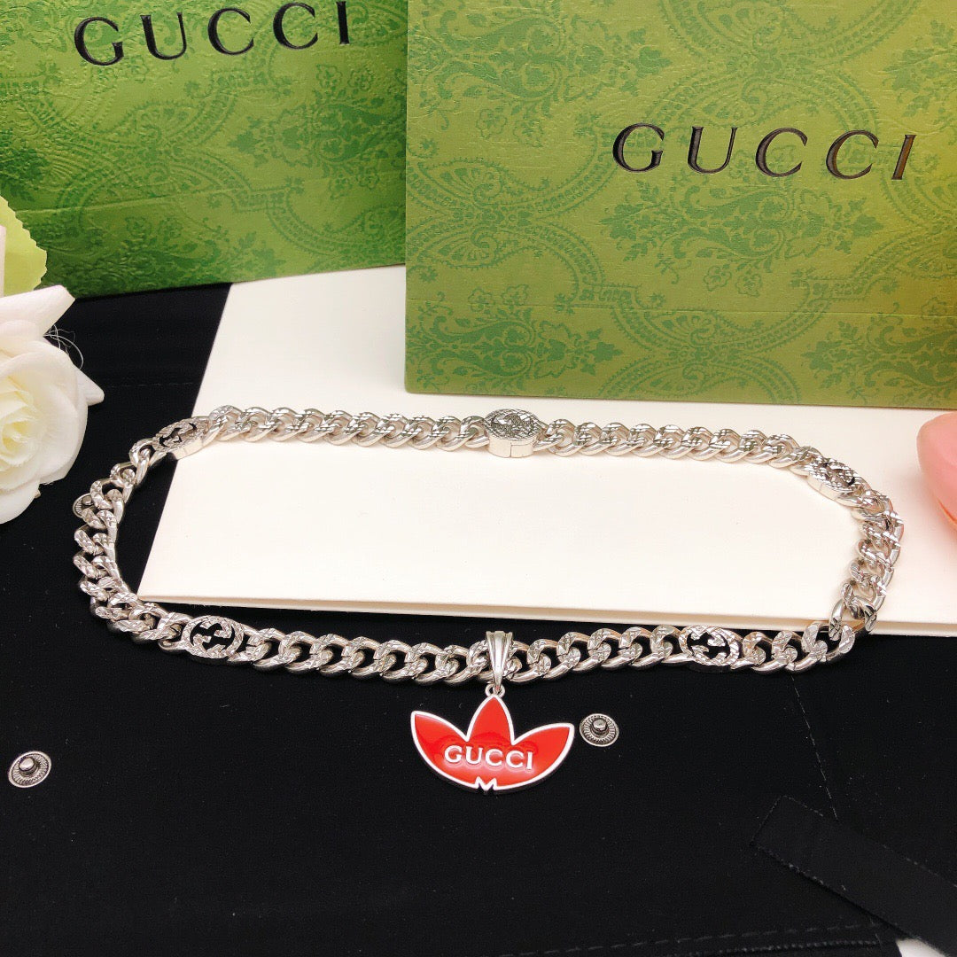 Chain Pendant Necklace in Gold-Tone – Red Detail front product view