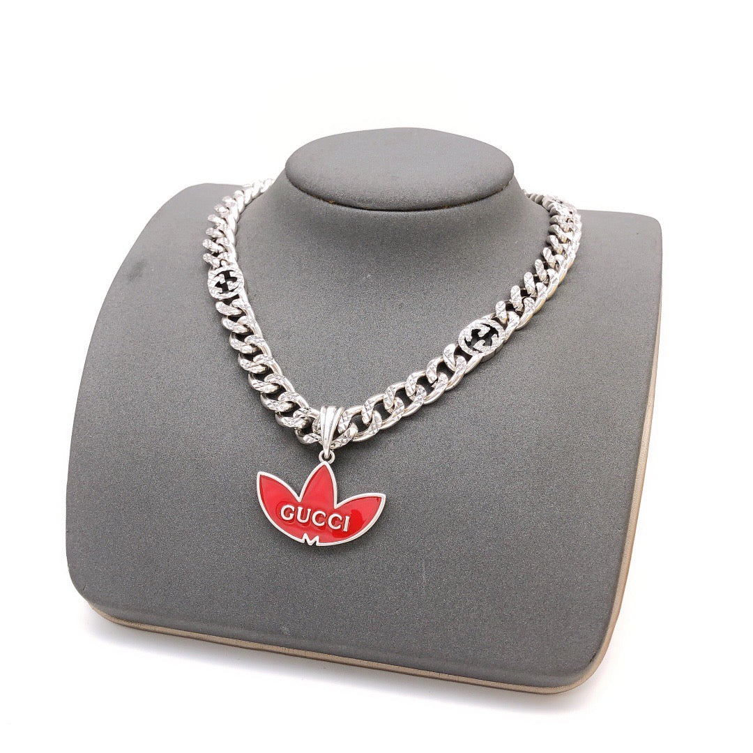 Chain Pendant Necklace in Gold-Tone – Red Detail front product view