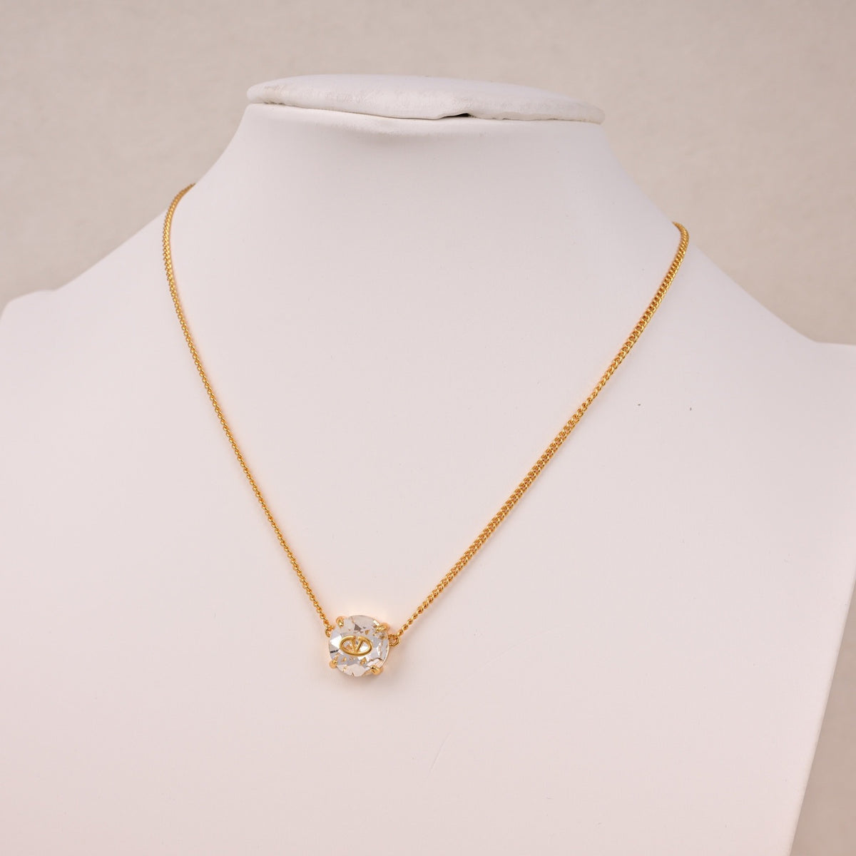Signature Emblem Pendant Necklace in Polished Metal-Tone – Design 10 close-up view