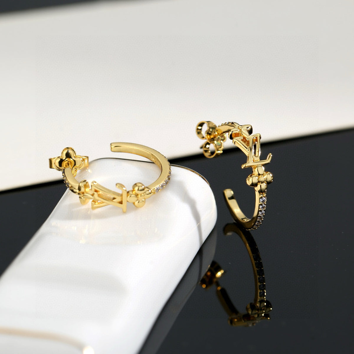 Letter Emblem Stud Earrings in Polished Metal-Tone – Design 047 close-up detail