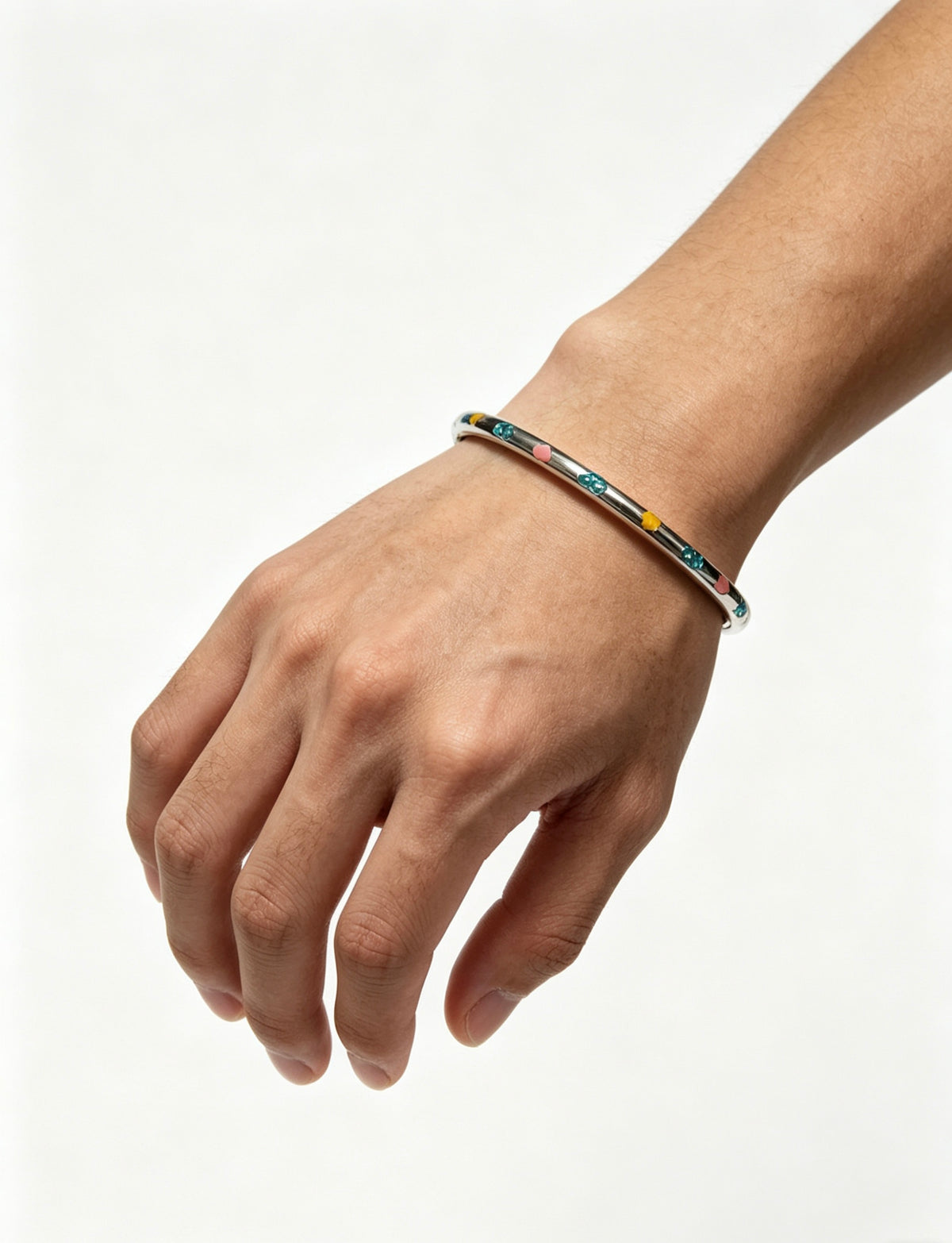 Signature Motif Bangle in Silver-Tone close-up detail