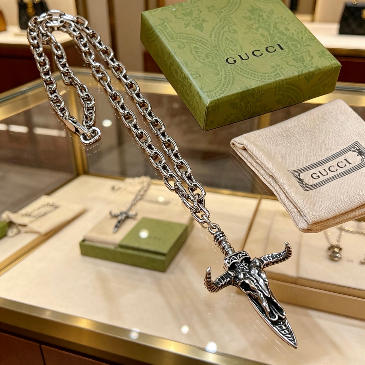 Double-G Emblem Pendant Necklace in Polished Metal-Tone – Design 227 close-up detail