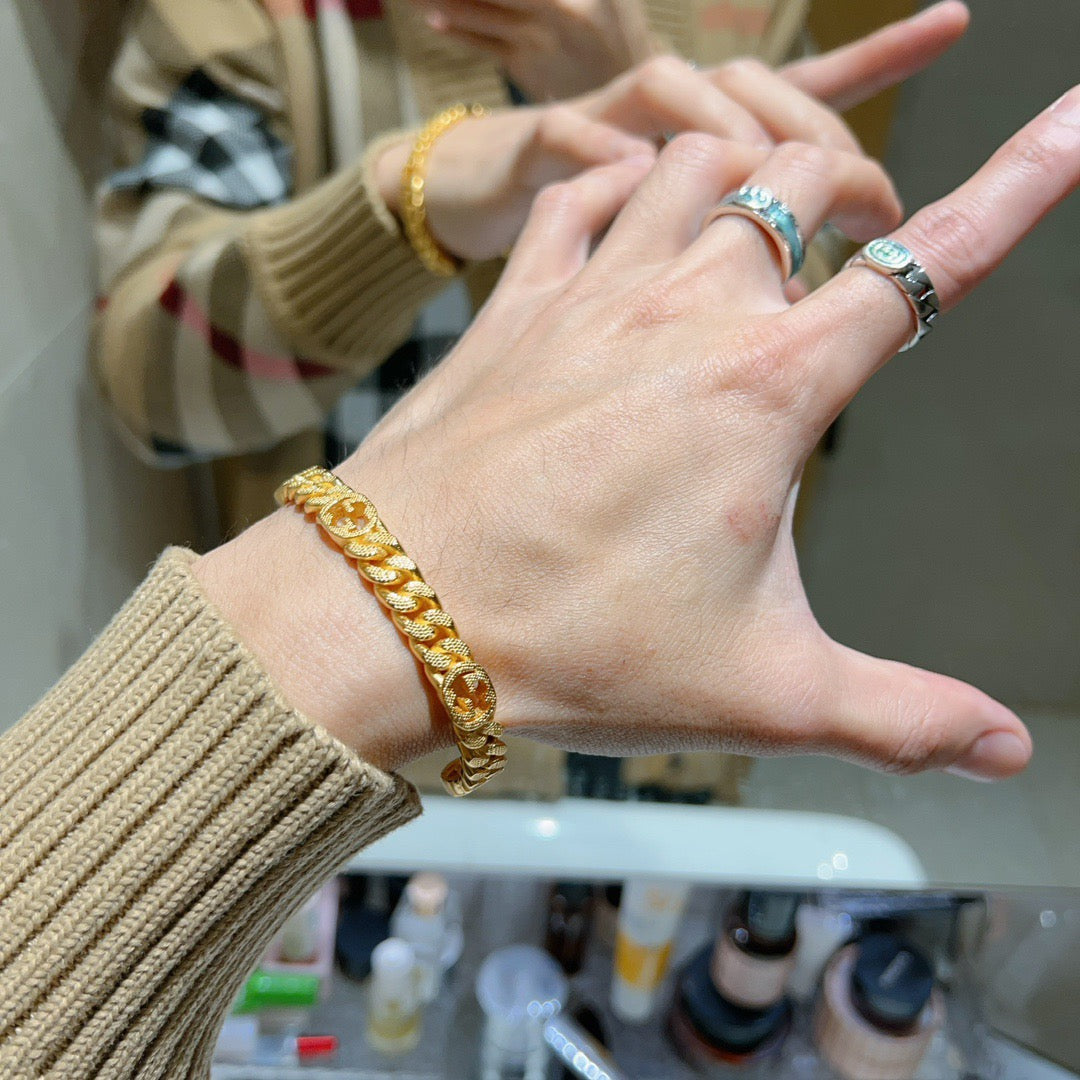 Double-G Emblem Bangle in Rose-Gold-Tone styled product view