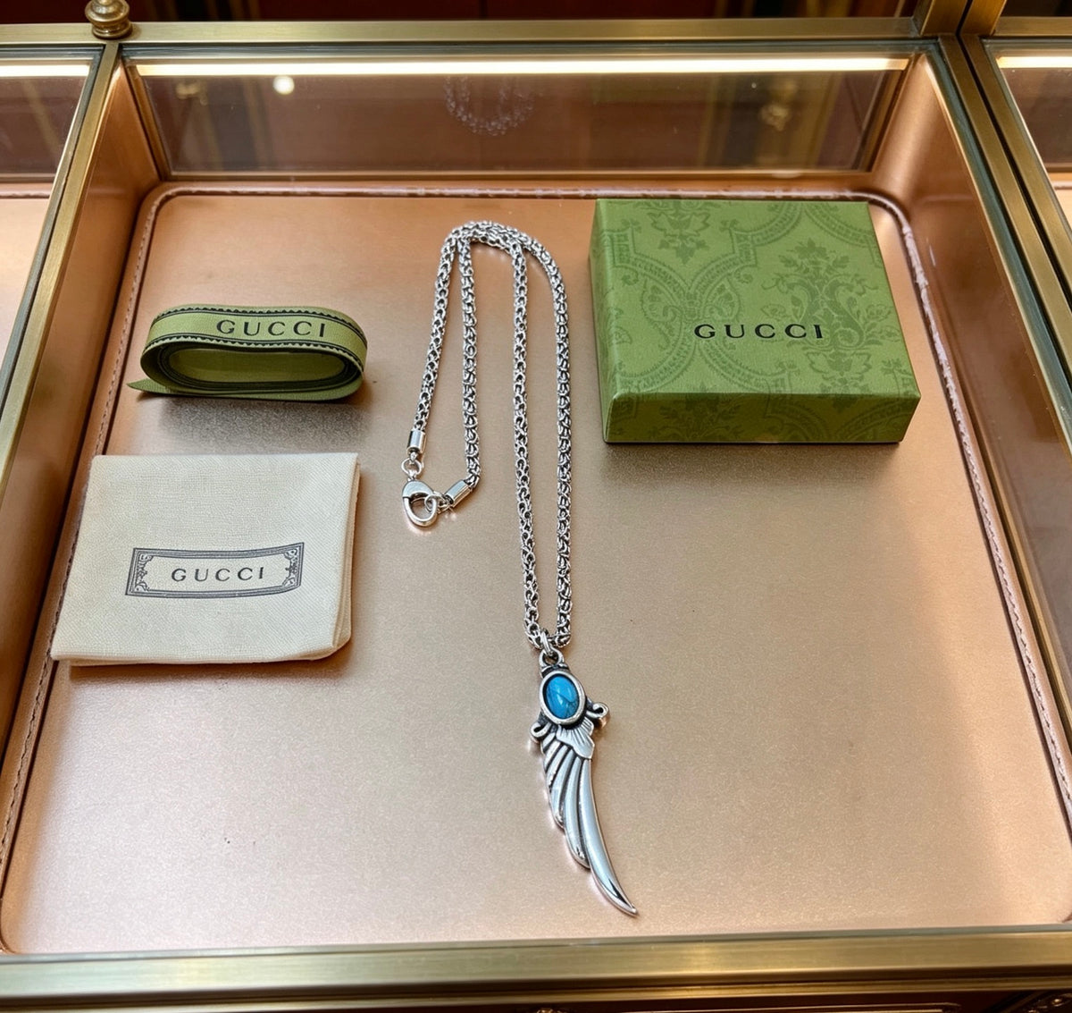 Double-G Emblem Pendant Necklace in Polished Metal-Tone – Design 225 styled product view