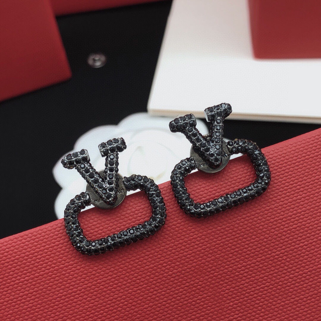 Signature Emblem Crystal-Accent Stud Earrings – Black – Design 04 front view