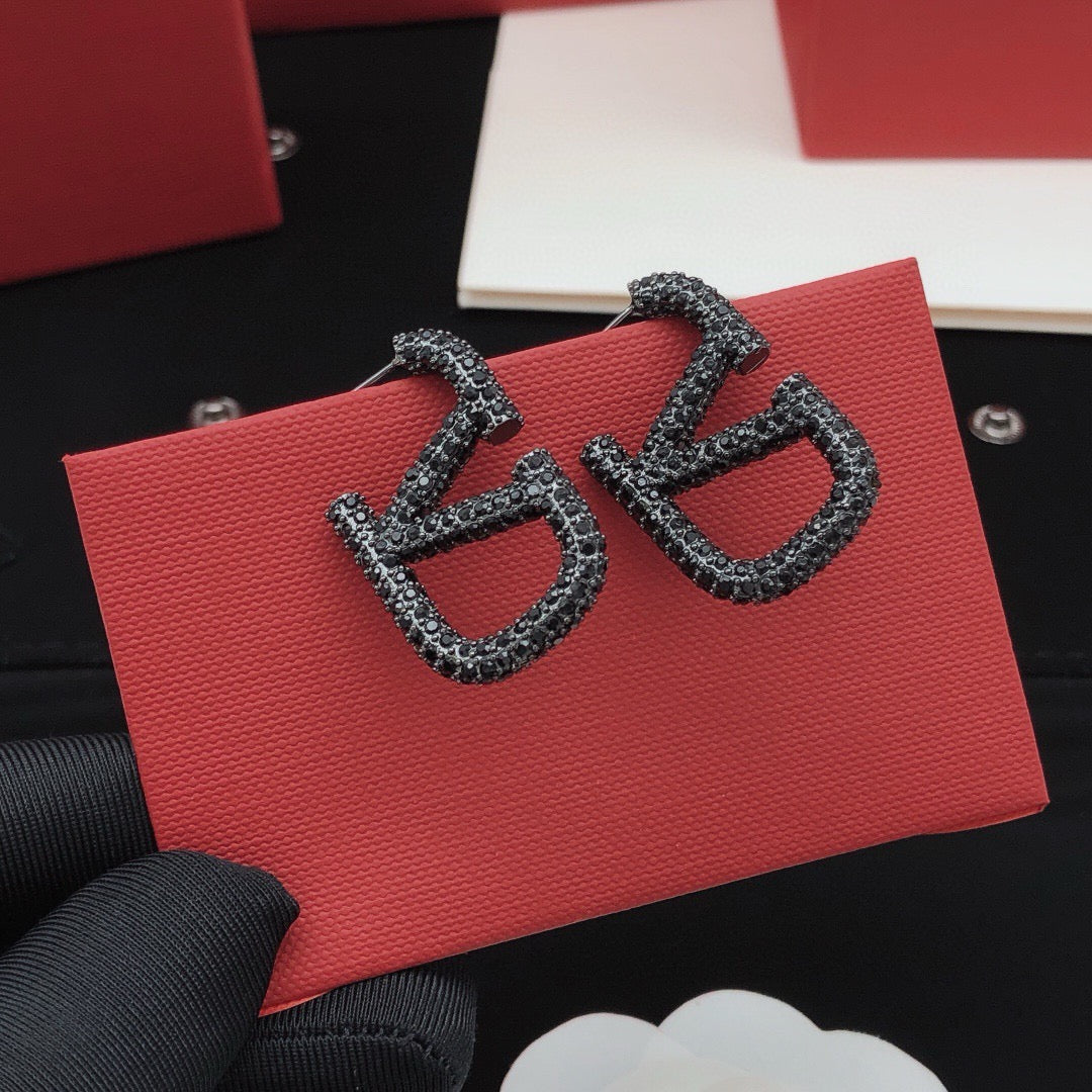 Signature Emblem Crystal-Accent Stud Earrings – Black – Design 03 front view