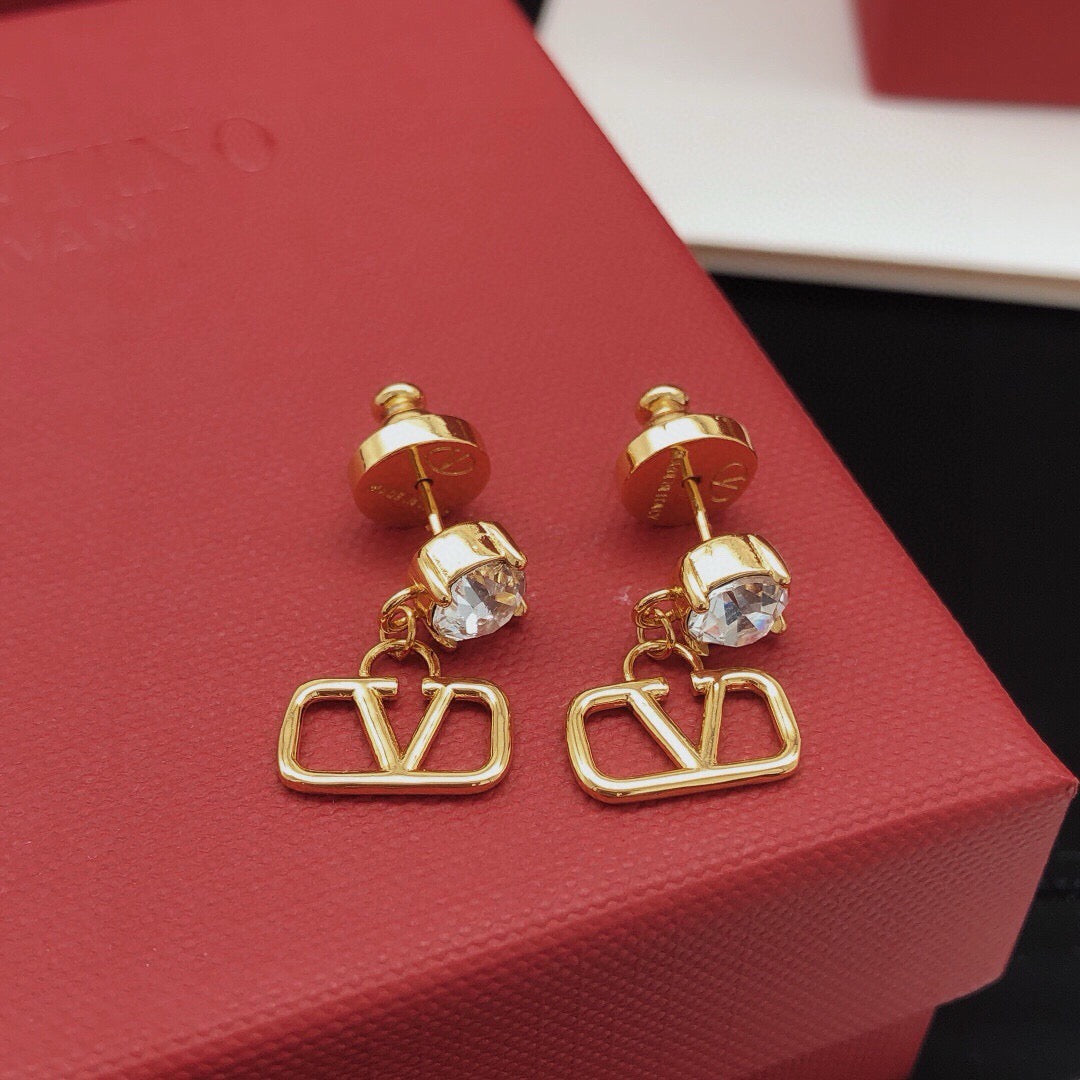 V Emblem Crystal-Accent Stud Earrings – Pink – Design 03 styled detail