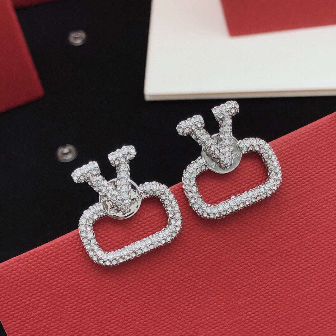 Signature Emblem Crystal-Accent Stud Earrings – Design 14 close-up view