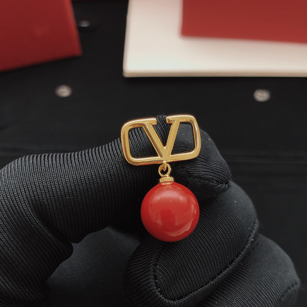 Signature Emblem Pearl-Detail Stud Earrings – Red detail view
