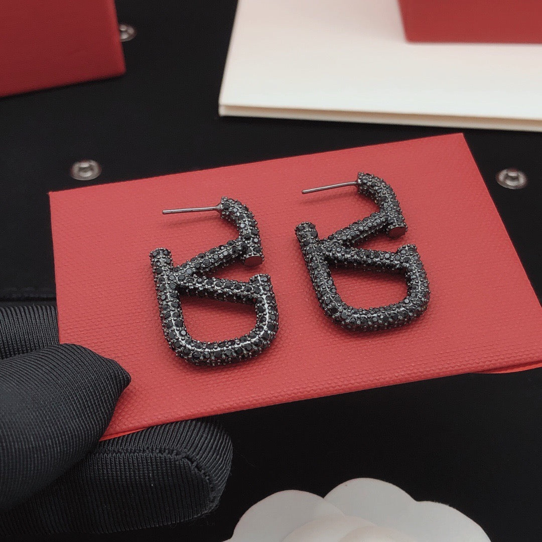 Signature Emblem Crystal-Accent Stud Earrings – Black detail view