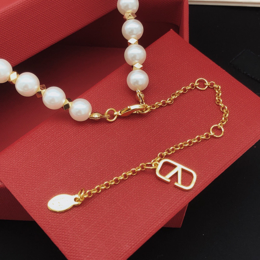 Signature Emblem Pendant Necklace in Gold-Tone – Design 08 close-up view