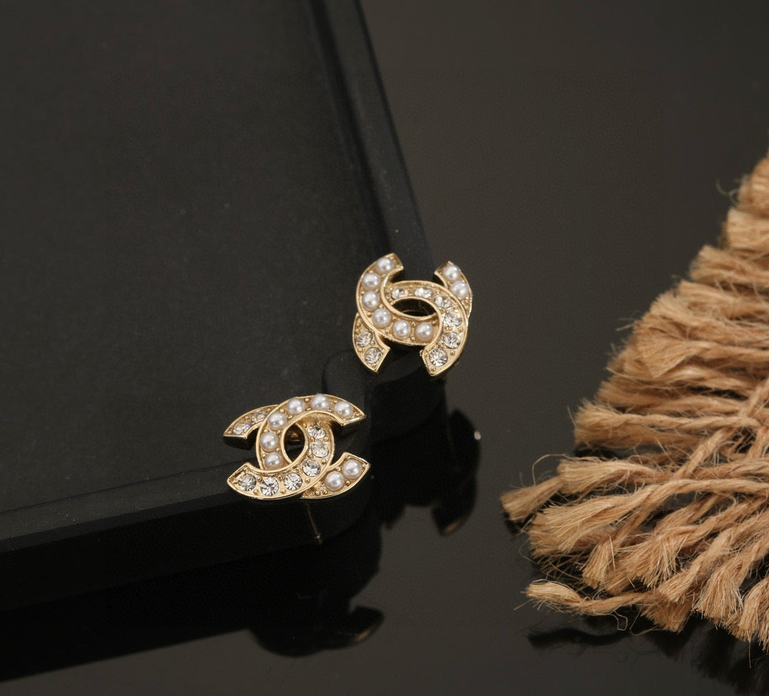 Double-C Emblem Stud Earrings in Polished Metal-Tone – Design 439 styled product view