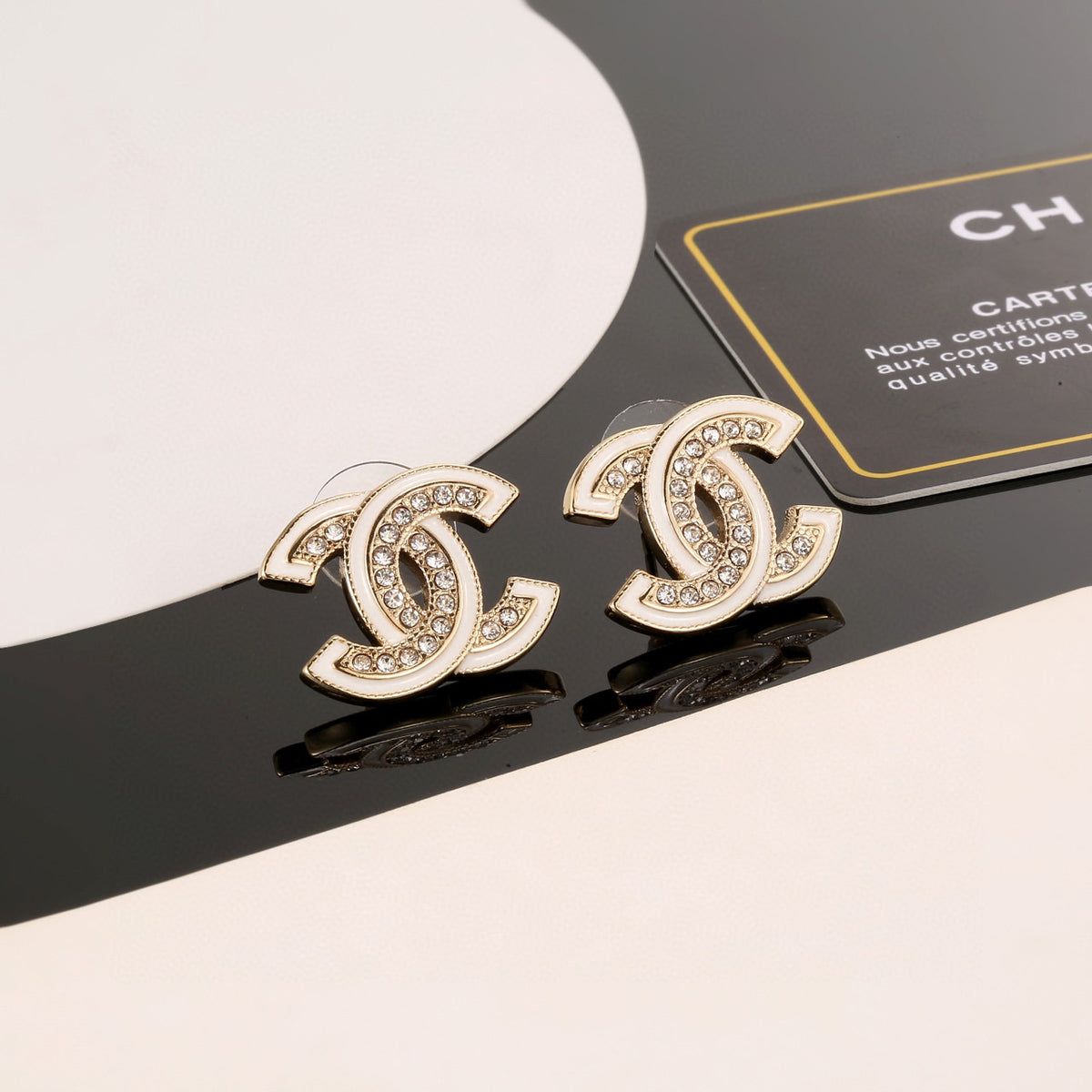 Double-C Emblem Stud Earrings in Polished Metal-Tone – Design 024 detail view