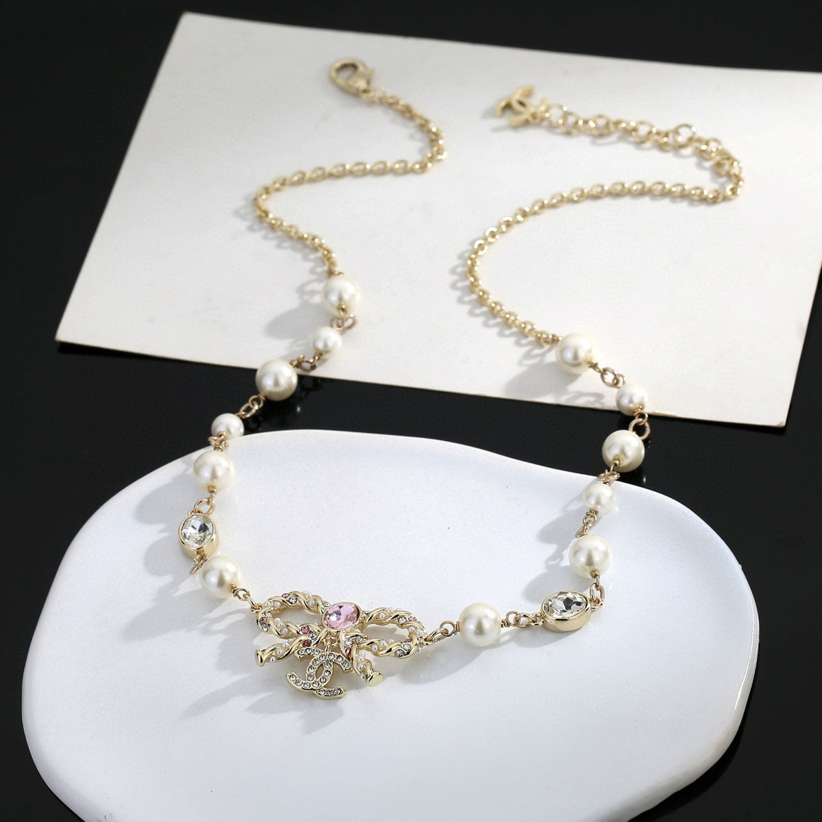Bow Pearl-Detail Pendant Necklace – Pearl Detail – Design 002 styled product view