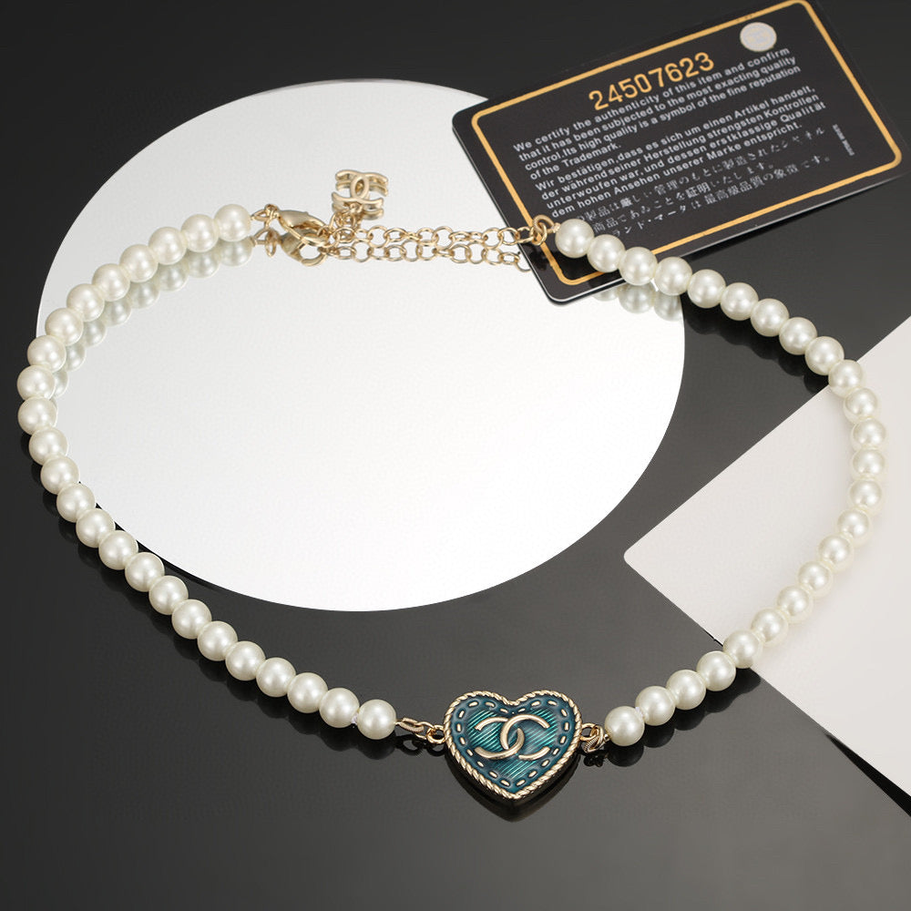 Double-C Emblem Bracelet in Polished Metal-Tone – Pearl Detail – Design 003 front product view