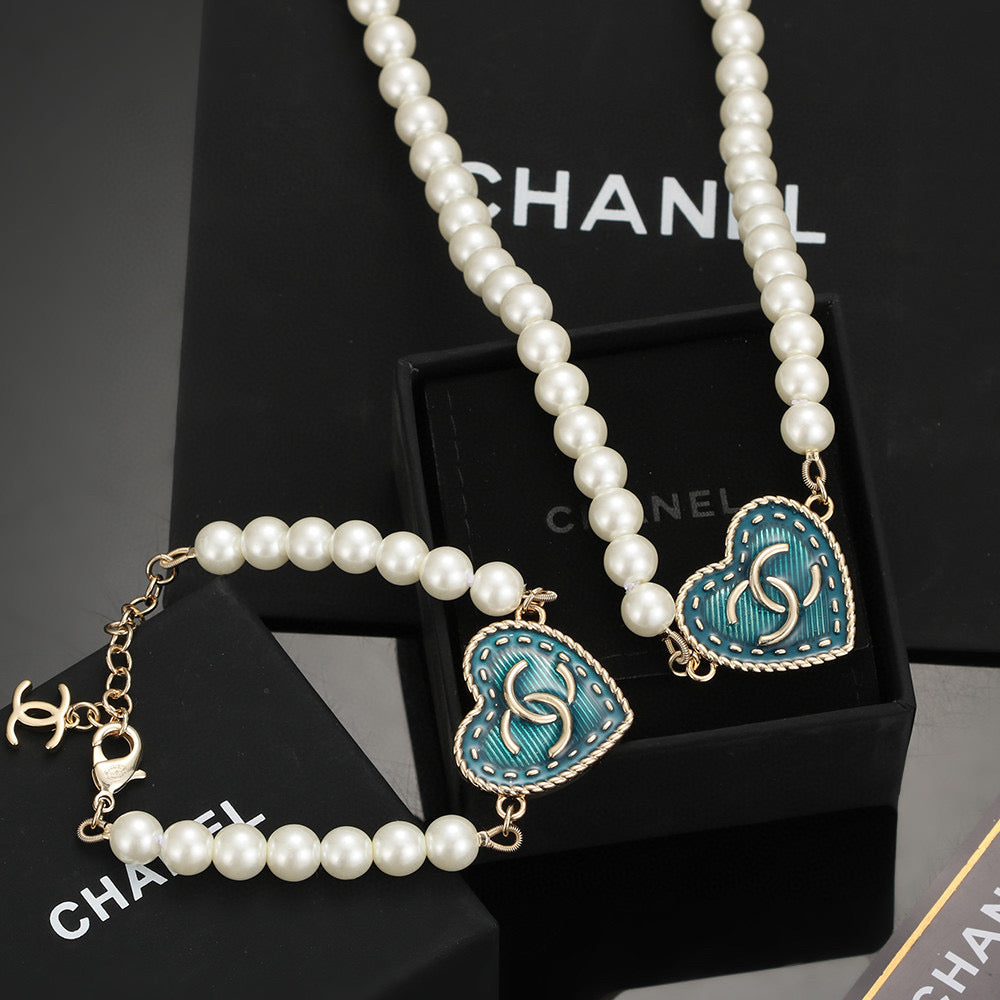 Double-C Emblem Bracelet in Polished Metal-Tone – Pearl Detail – Design 003 main product view