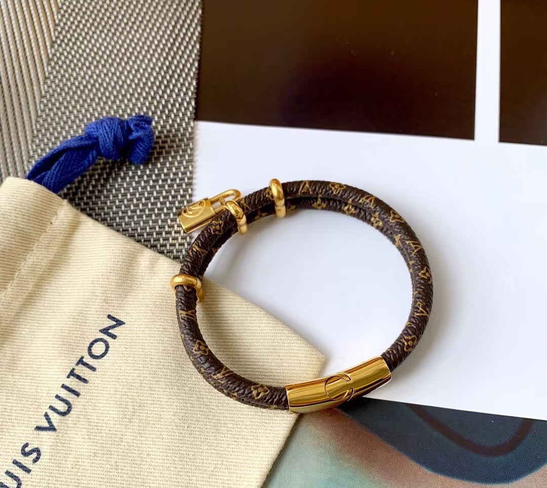 Letter Emblem Bangle in Polished Metal-Tone – Leather Detail main product view