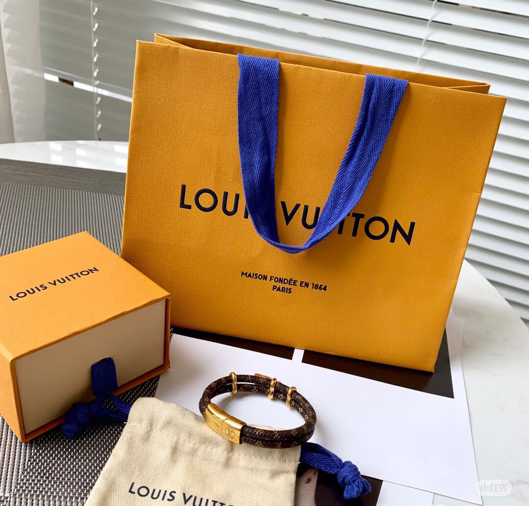 Letter Emblem Bangle in Polished Metal-Tone – Leather Detail side detail