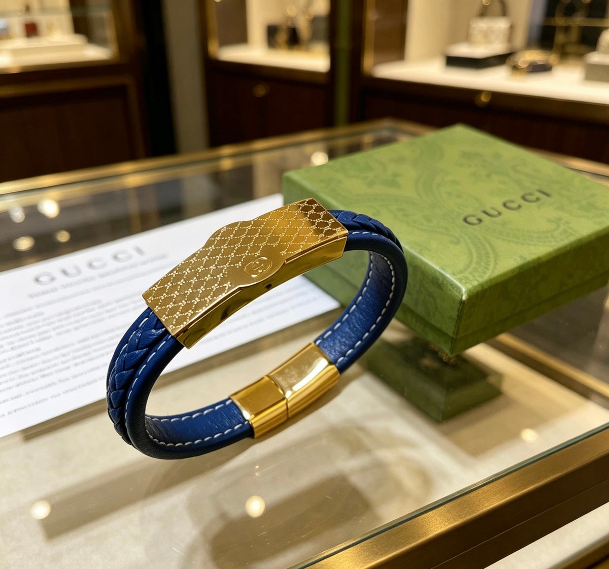 Double-G Emblem Bangle in Polished Metal-Tone – Leather Detail – Design 003 front product view