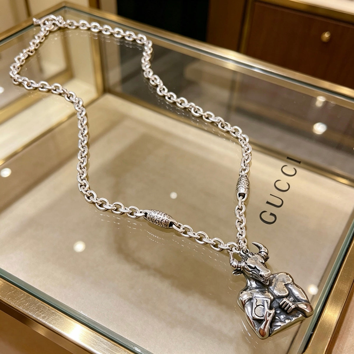 Double-G Emblem Pendant Necklace in Polished Metal-Tone – Vintage Detail – Design 076 main product view
