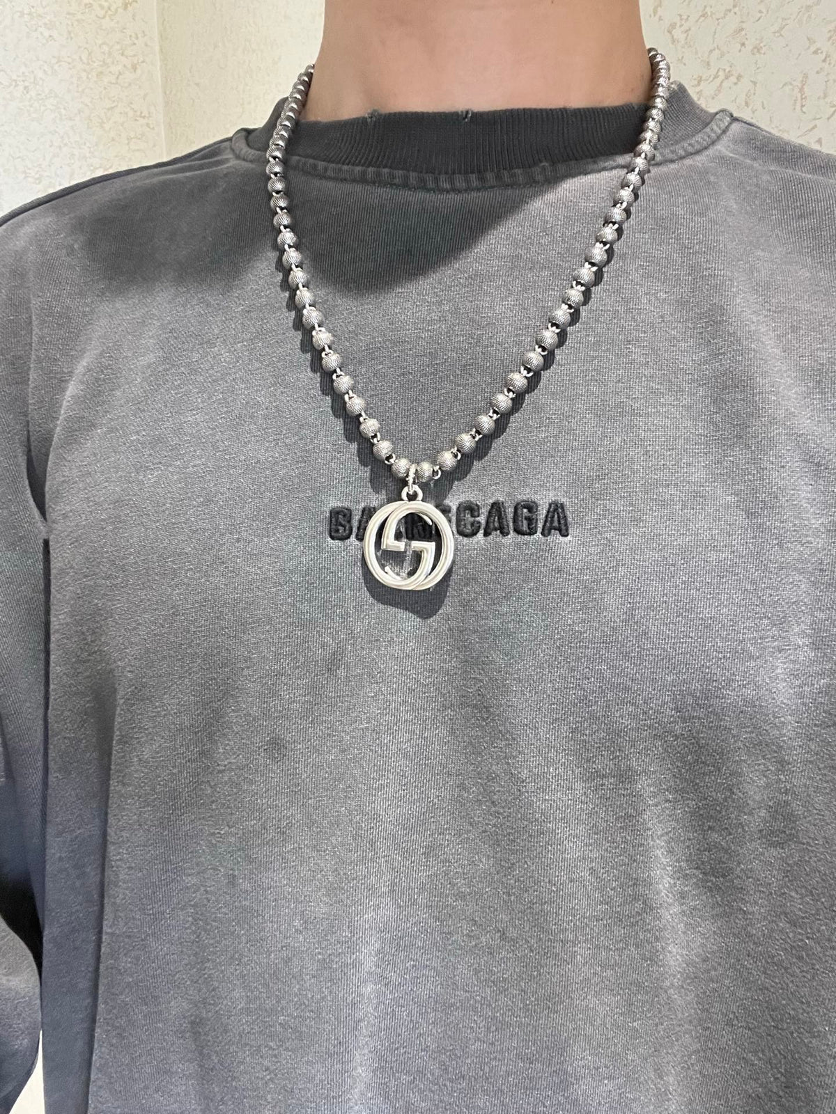 Double-G Emblem Pendant Necklace in Polished Metal-Tone – Design 258 close-up detail