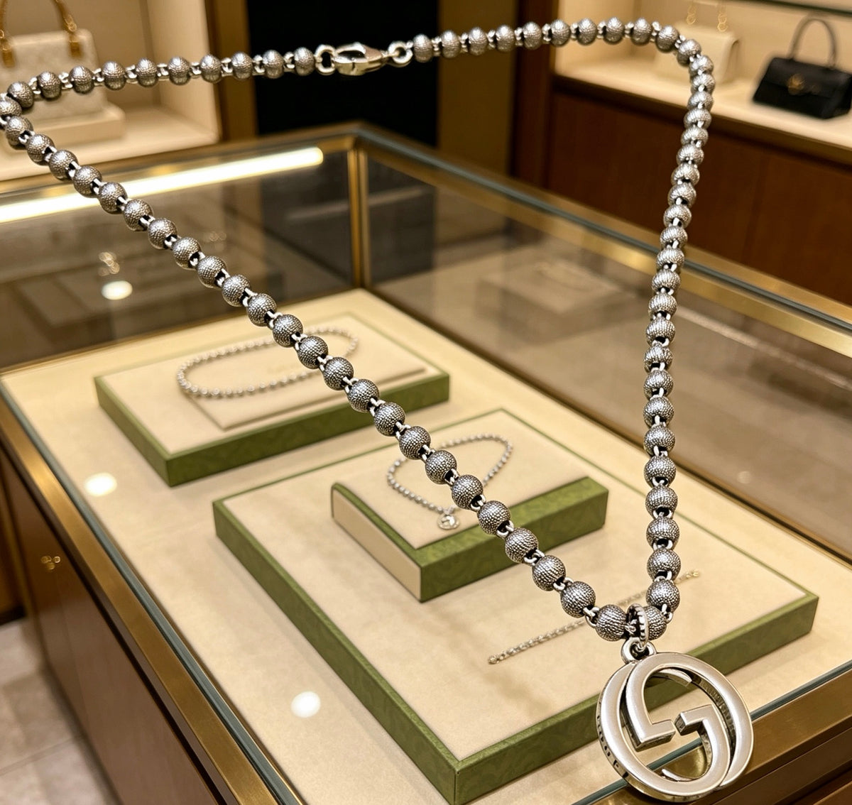 Double-G Emblem Pendant Necklace in Polished Metal-Tone – Design 244 styled product view