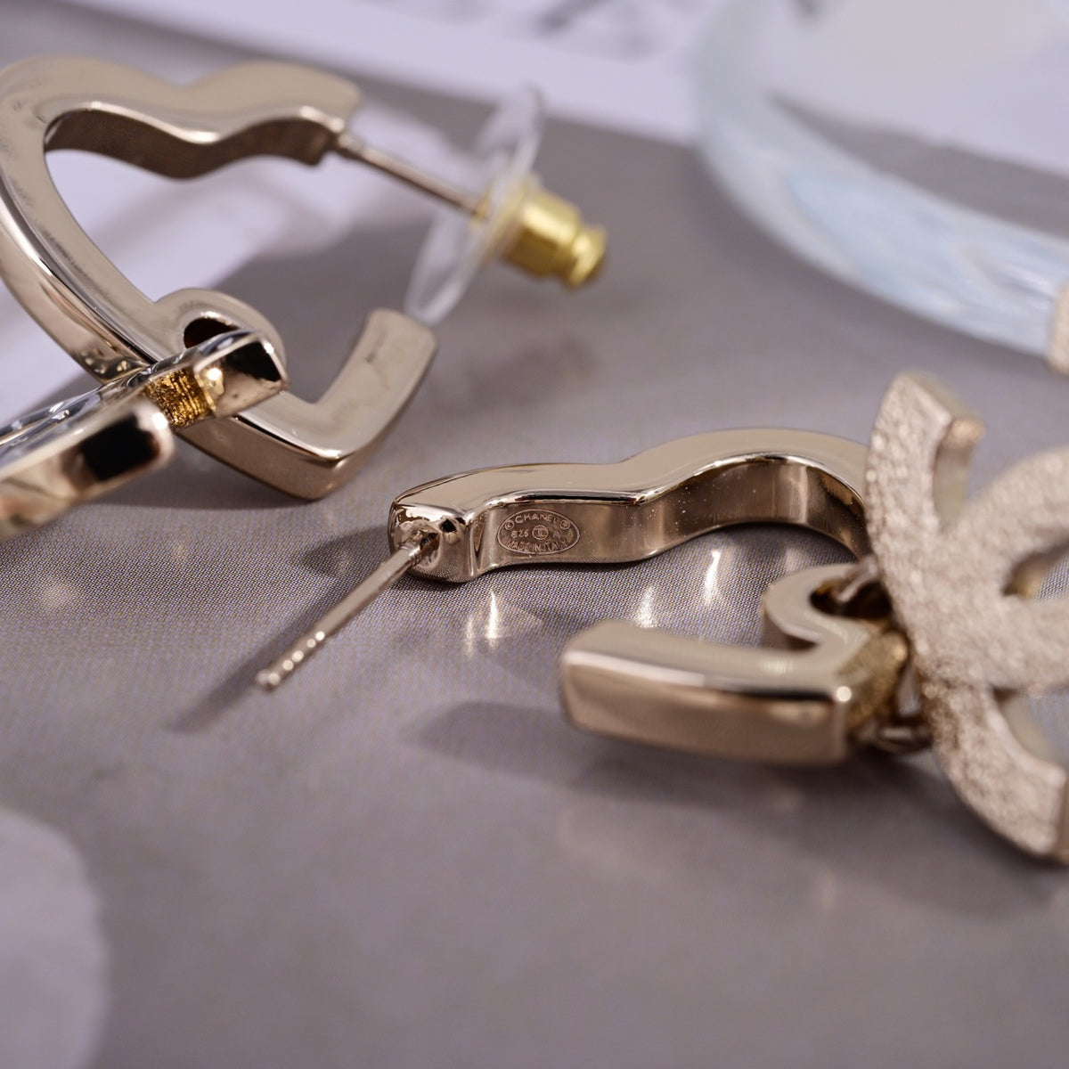 Signature Emblem Stud Earrings in Polished Metal-Tone – Design 125 detail view