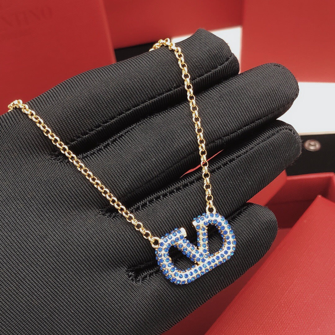 Signature Emblem Crystal-Accent Pendant Necklace – Design 05 close-up view