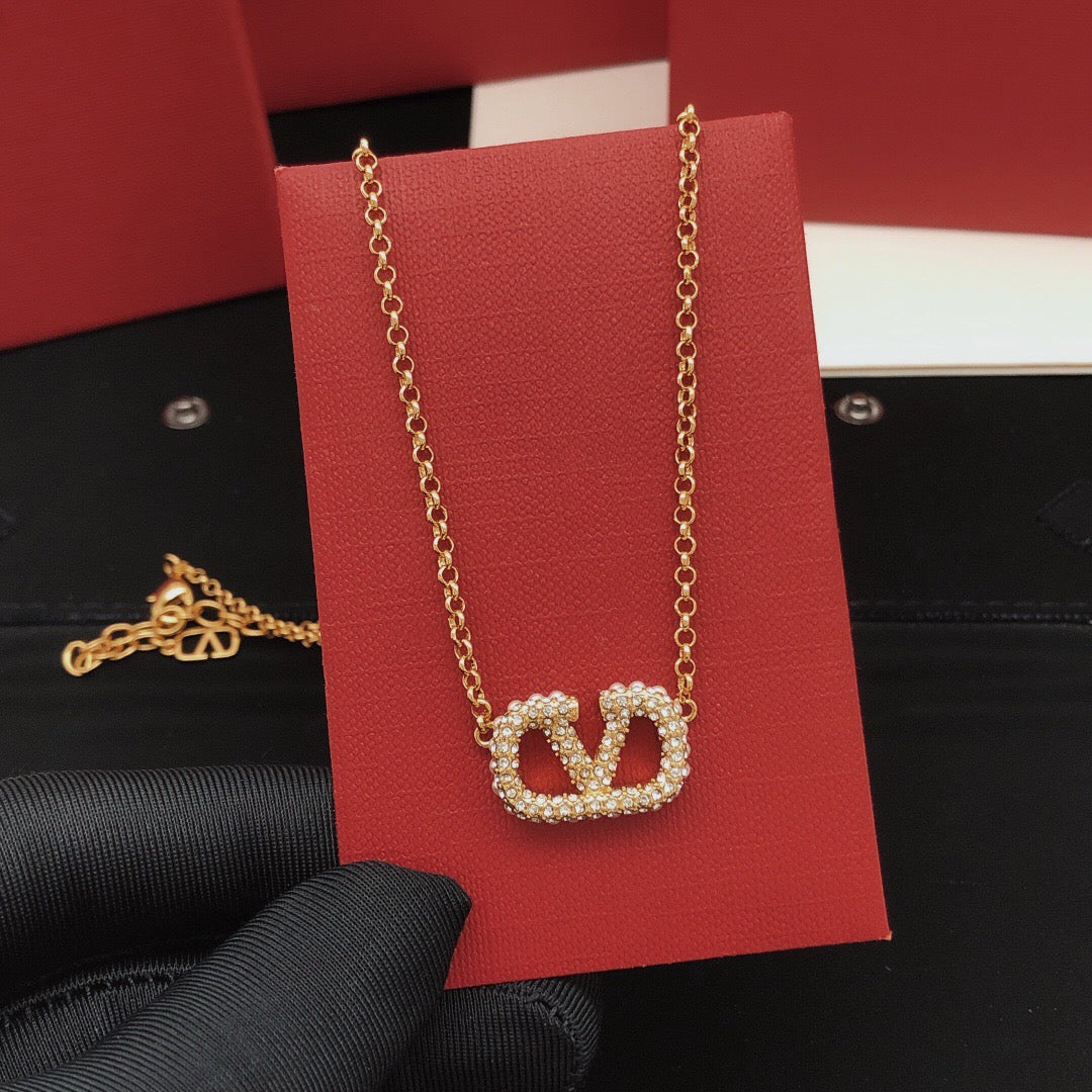 Signature Emblem Pendant Necklace in Gold-Tone – Design 04 styled detail