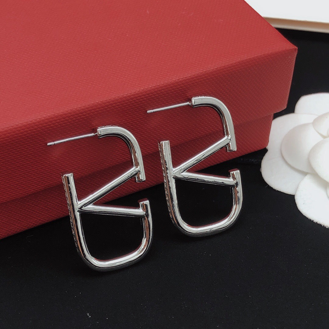 V Emblem Crystal-Accent Stud Earrings – Purple – Design 04 close-up view